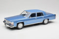 Cadillac Fleetwood Brougham Blue Metallic MCG 1/18