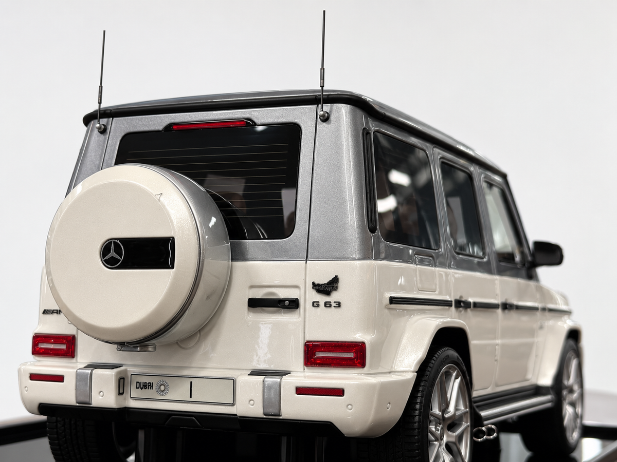 1/18 Resin Mercedes-Benz AMG G 63 UAE Golden Jubilee Edition – Motor Helix (White/Silver)