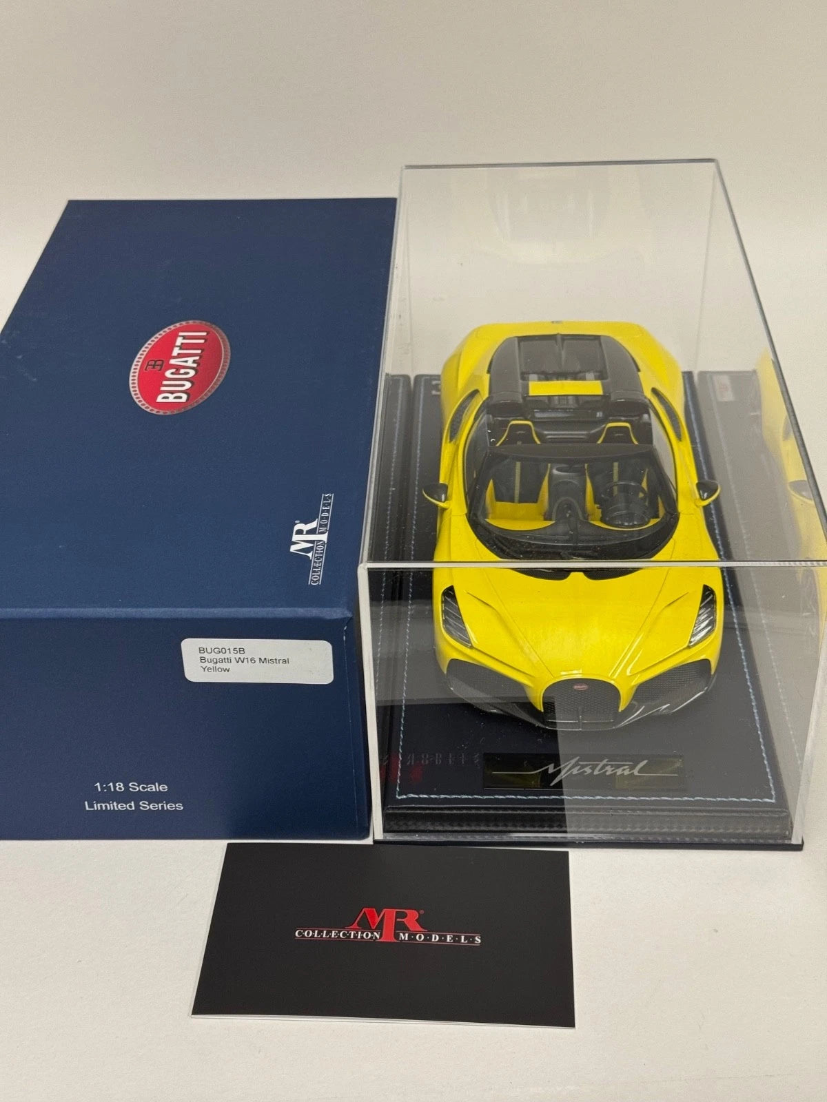 1/18 MR Collection Bugatti W16 Mistral in Yellow on leather base BUG015B
