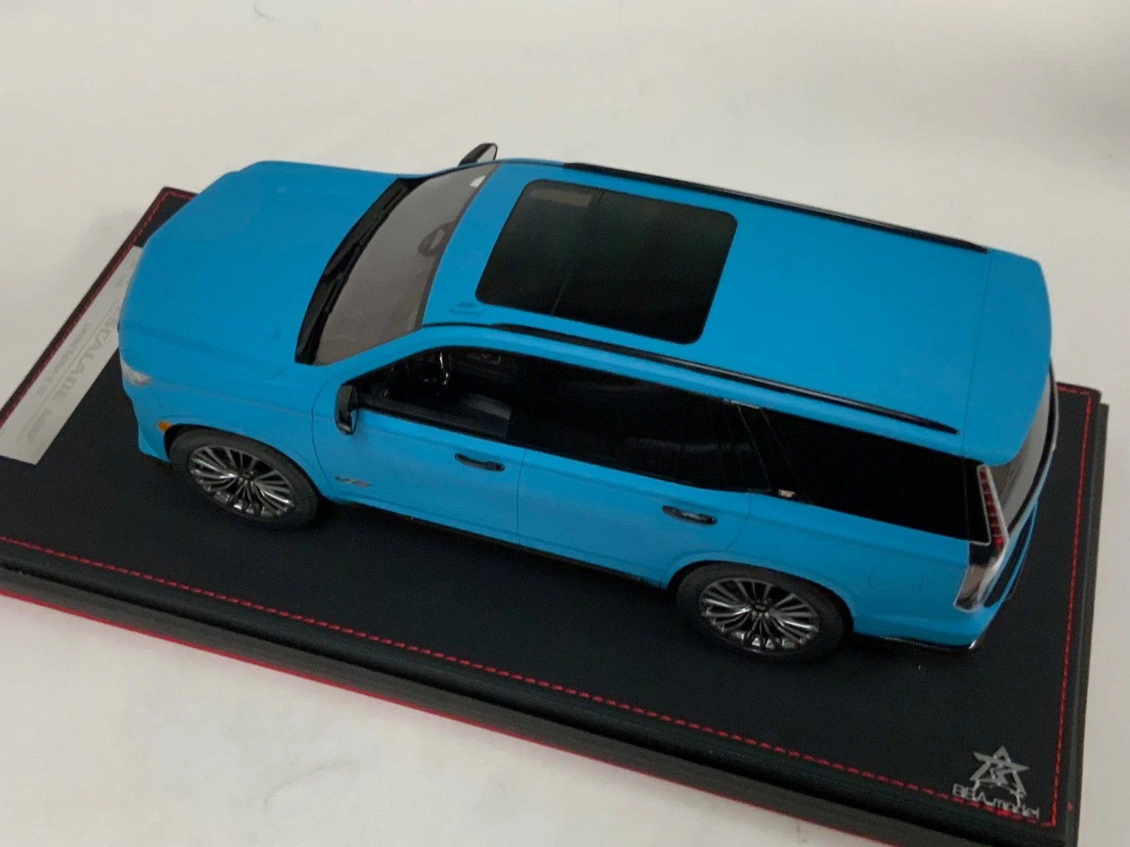 1/18 BBA Models Cadillac Escalade V series 2022 in Matte Blue on Leather Base